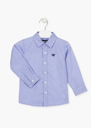 CAMISA DE COLOR AZUL CON BORDADO EN PECHO